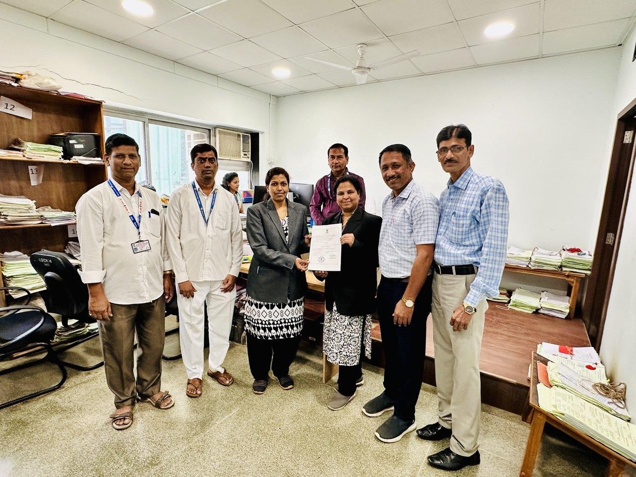 Trust committee receiving welfare recognition certificate